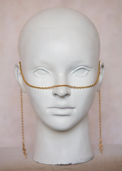 Bijou facial acier inoxydable doré, vibe mystique. Style serpent, chaos sacré, accessoire rituel, costume ou photoshoot.