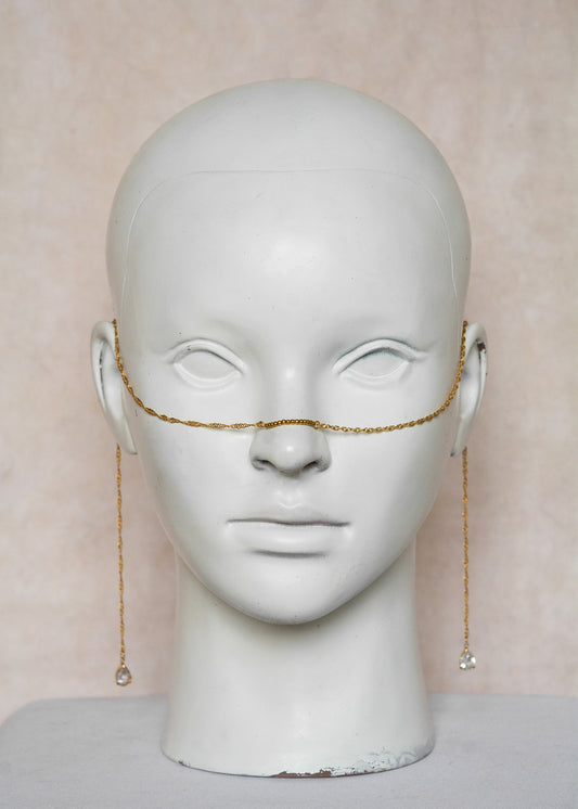 Chaîne de visage en acier inoxydable doré, torsadée avec pendentifs zircon translucide. Bijou élégant soirée ou mariage.