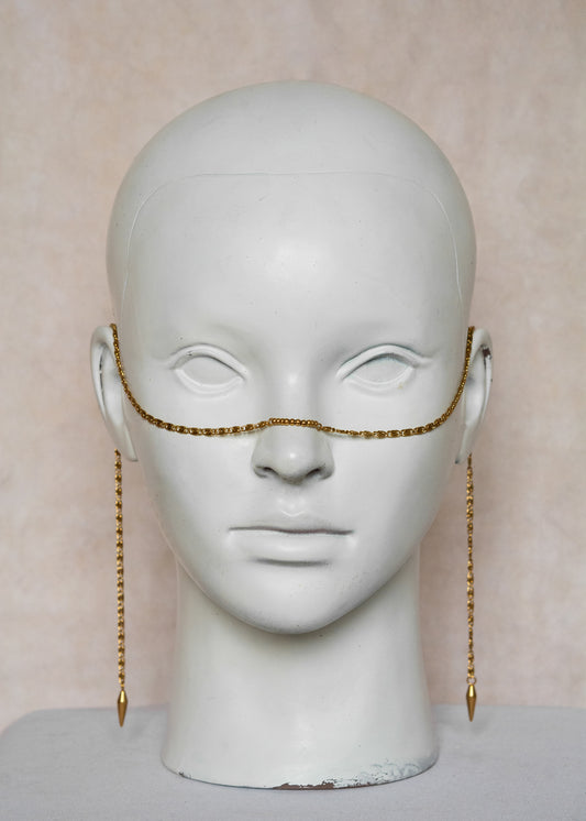 Chaîne de visage en acier inoxydable doré, maillage géométrique oriental, billes dorées et piques dorés. Bijou chic soirée ou festival.