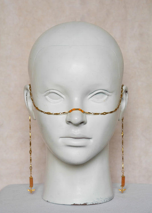 Chaîne de visage en acier inoxydable doré, maillage losange, pierres d’agate orange et charm oiseau. Bijou boho chic solaire.