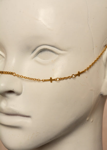 Chaîne de visage mystique en acier inoxydable doré avec petites croix décoratives. Accessoire bohème chic, spirituel et minimaliste, parfait pour festivals, événements et cérémonies.